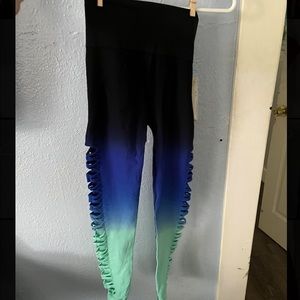 Pink Victoria’s Secret workout leggings.